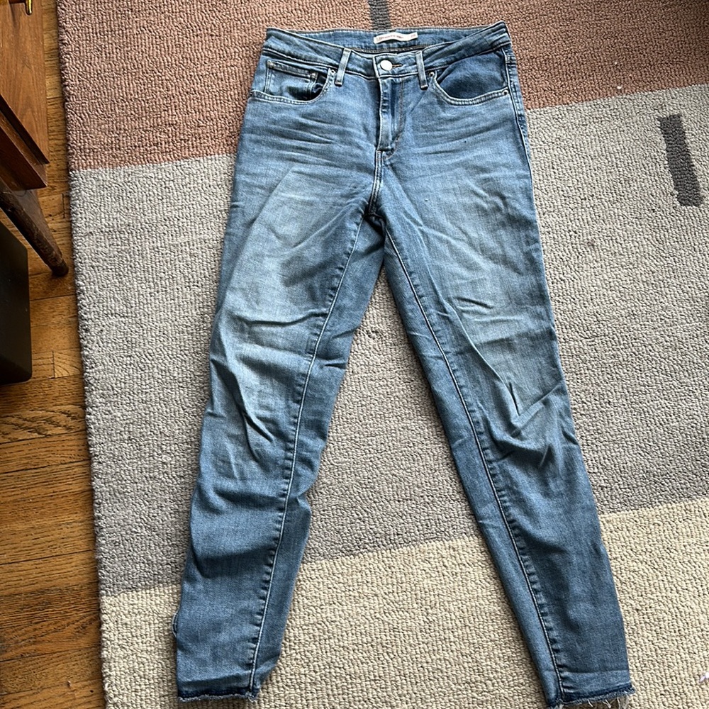 Levi’s 721 high rise skinny jeans with denim bows on the ankles